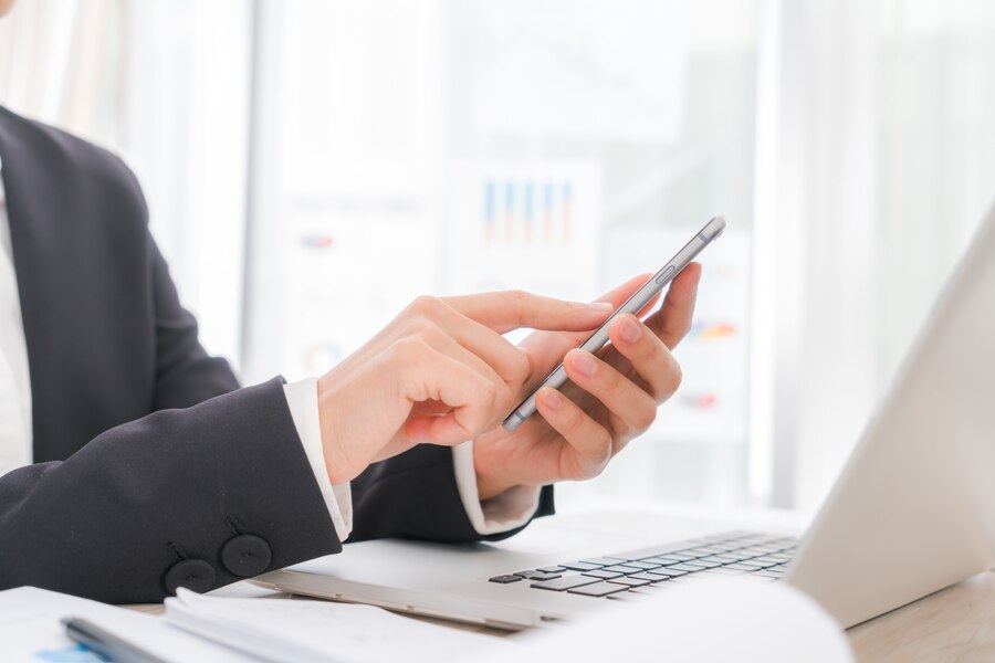 closeup-business-woman-hand-typing-laptop-keyboard-with-m_1232-2746